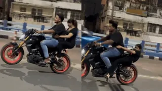 Bike Stunt Turns Deadly: Woman Gets Stuck Between Tyre And Bike’s Seat During Failed Wheelie | Viral Video
